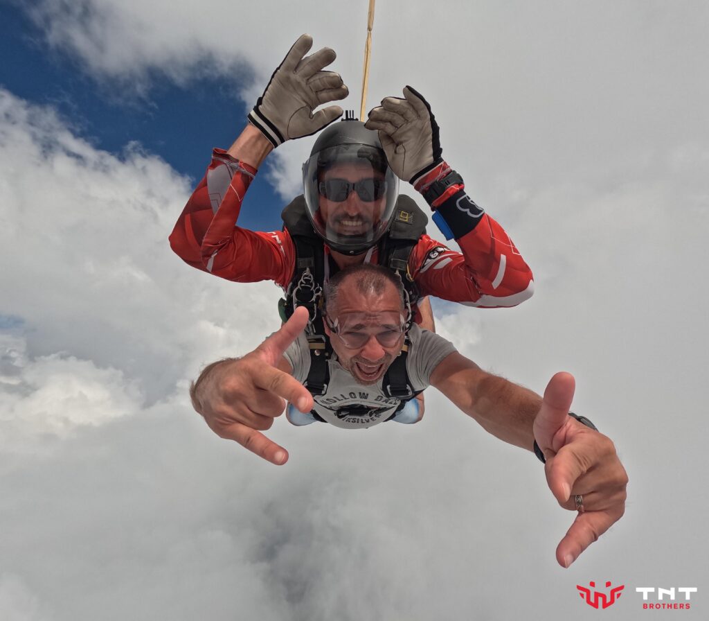 Tandem skydive with TNT Brothers above the clouds