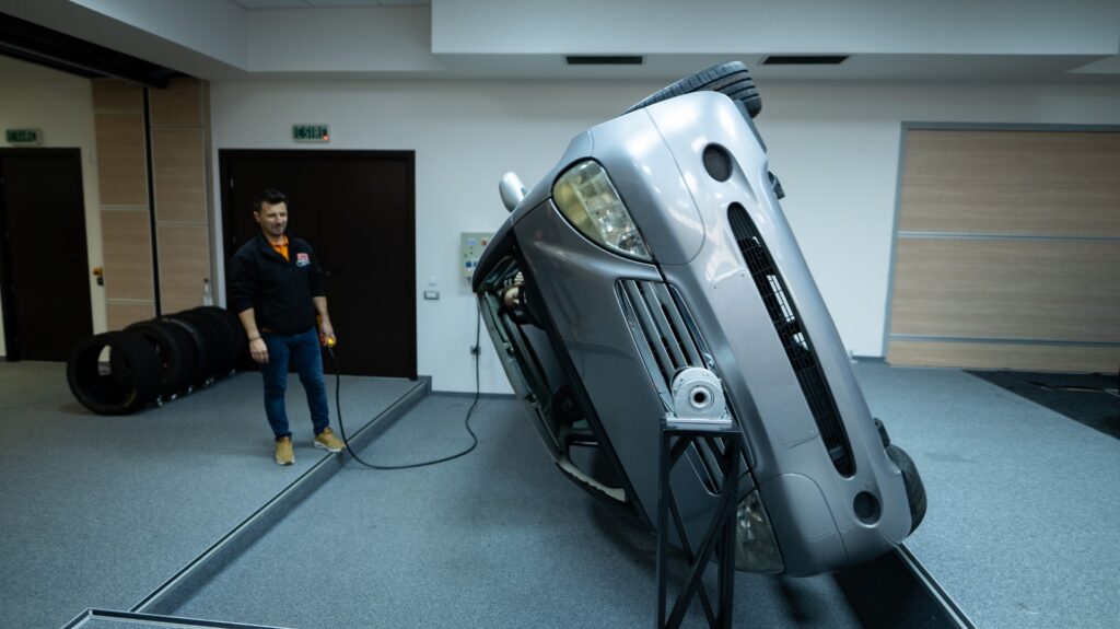 Vehicle rollover simulator used during training at Academia Titi Aur