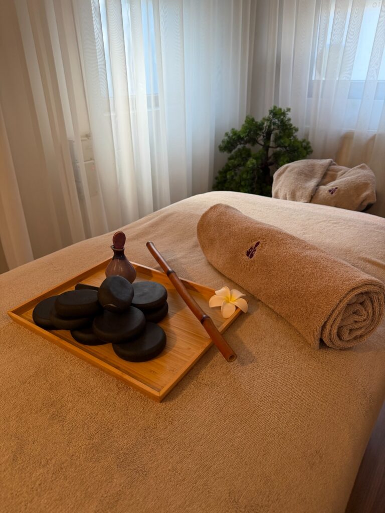 Hot stone massage setup at Buddha Spa