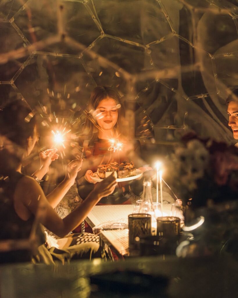 Celebration inside a Linea rooftop igloo