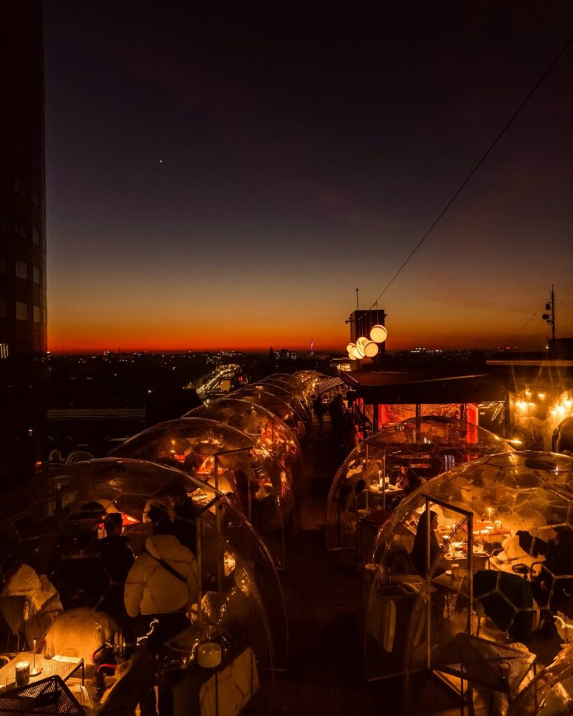 Linea rooftop igloos at sunset in Bucharest